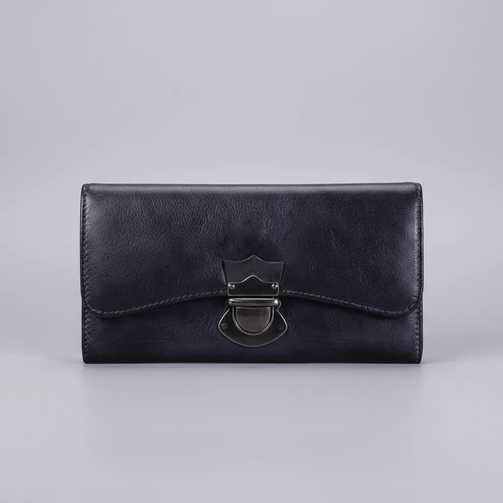 Black leather wallet with a metal clasp on a light gray background