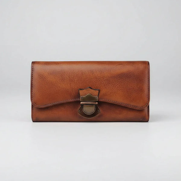Brown leather wallet with a clasp on a white background