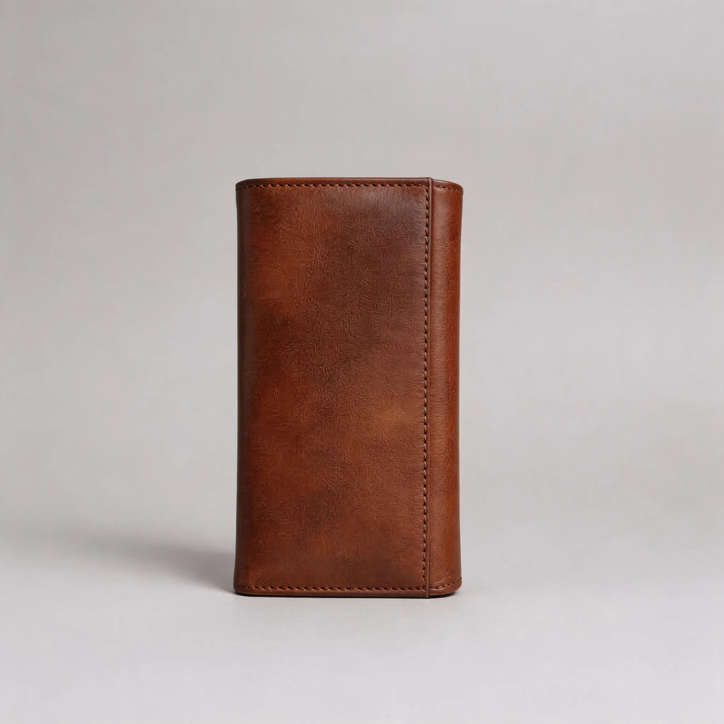 Brown leather wallet on a light gray background