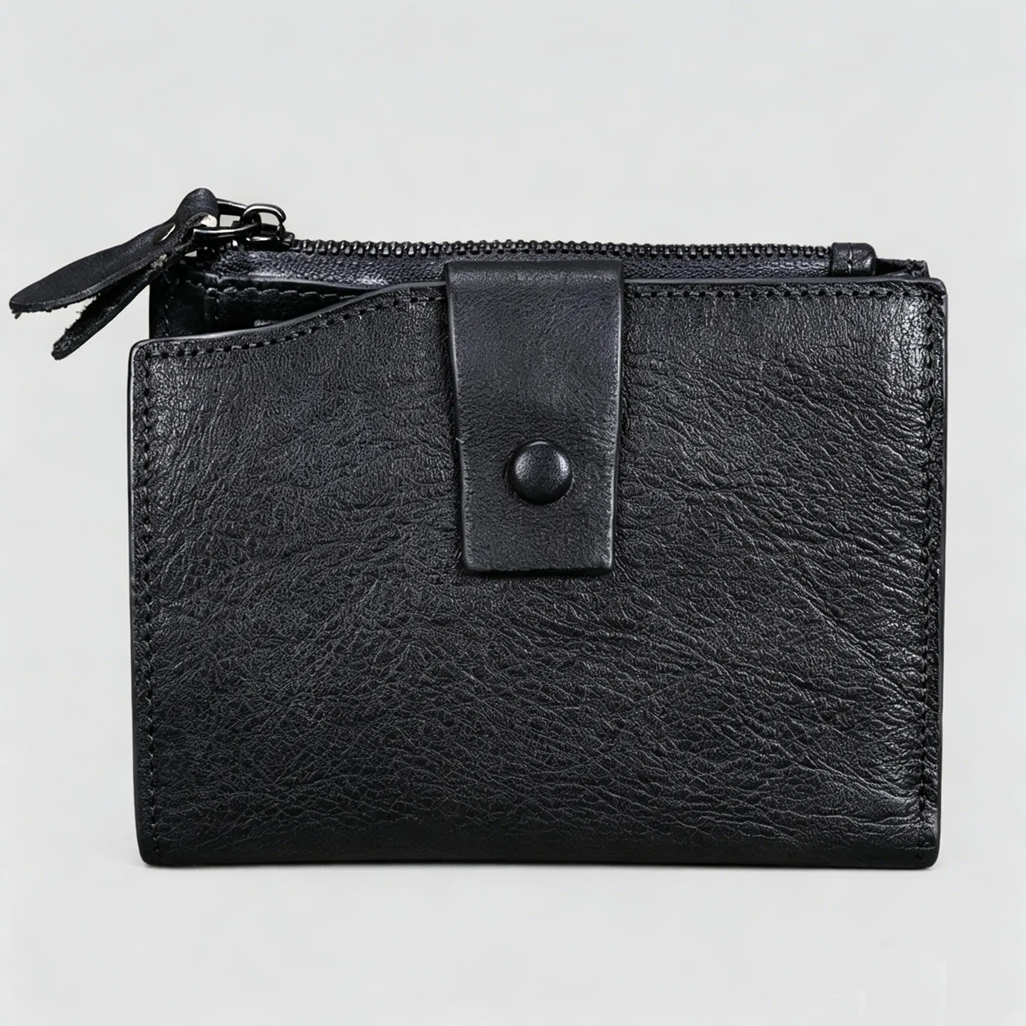 Black leather wallet with a zipper on a light gray background