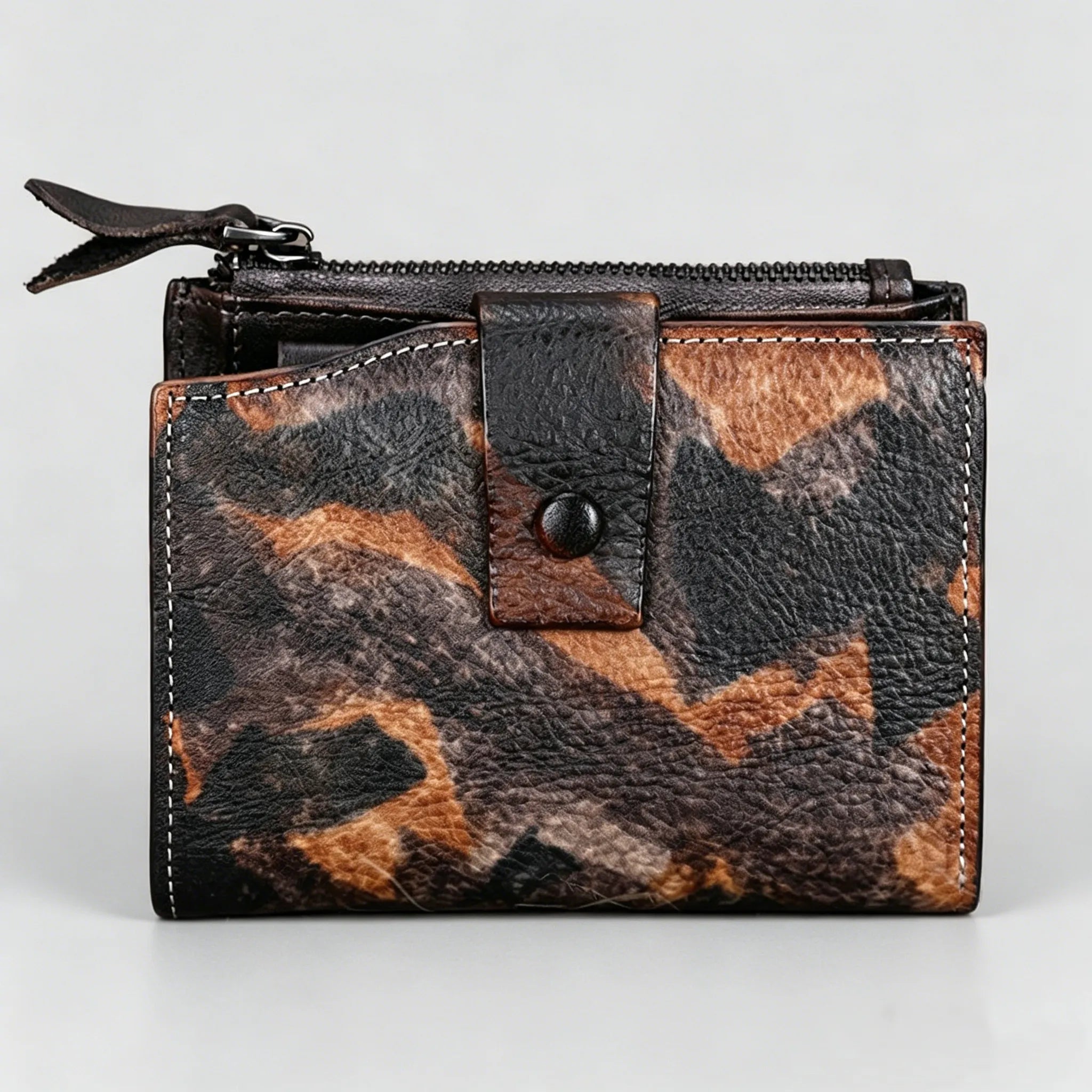 Leopard print wallet with a zipper on a light gray background