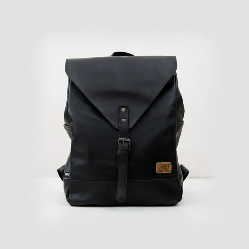 Black backpack with a buckle on a white background