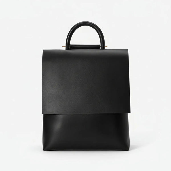 Black leather backpack on a white background