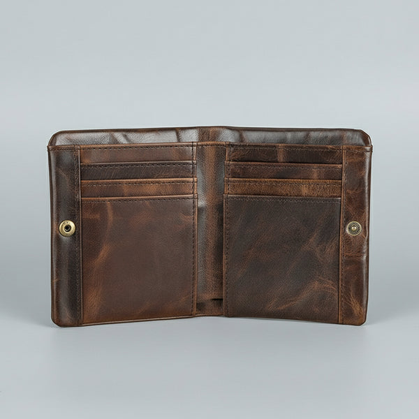 Brown leather wallet on a light gray background