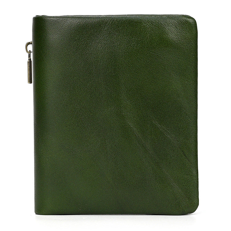 Green leather zippered case on a white background