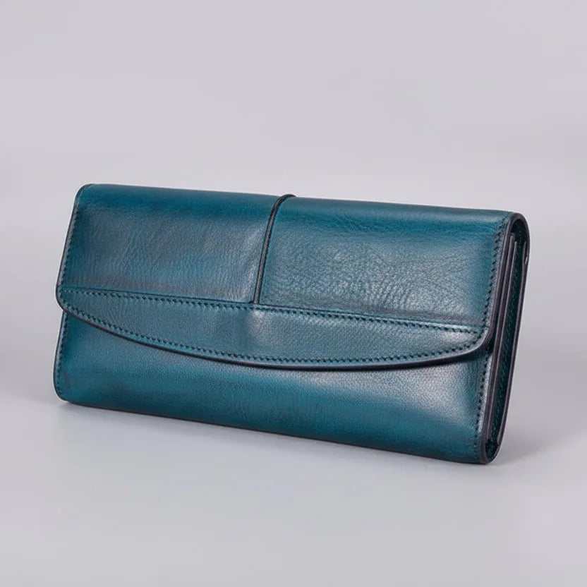 Blue leather wallet on a light gray background