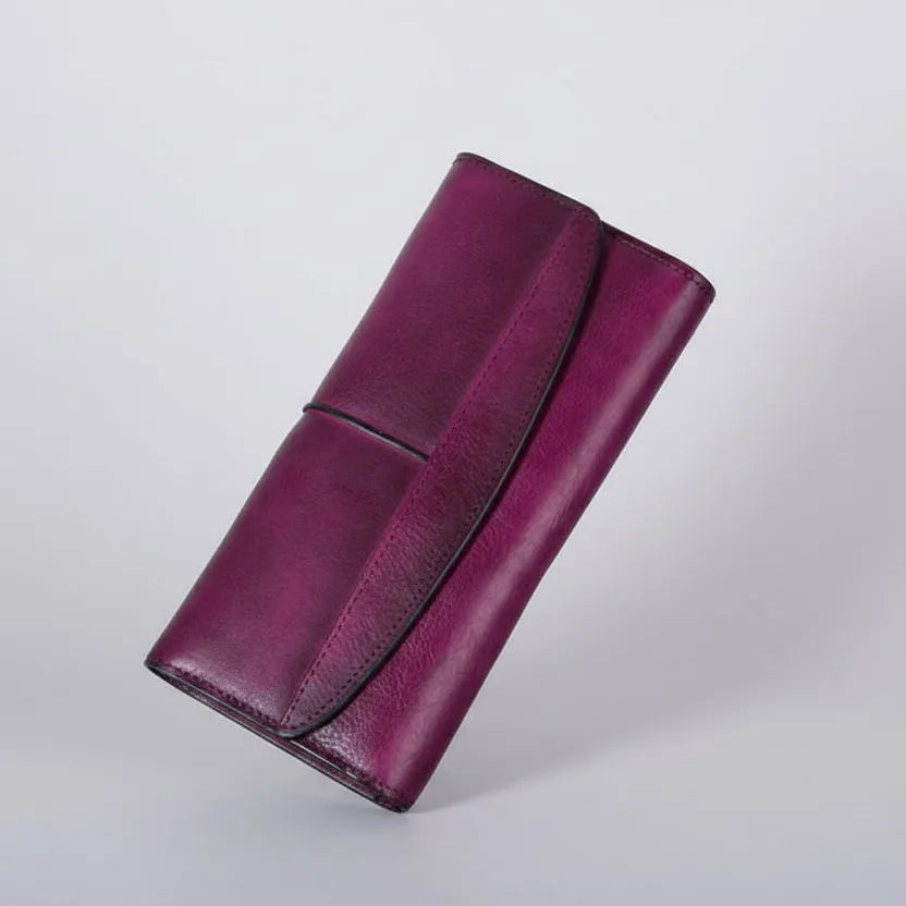 Purple wallet on a light gray background