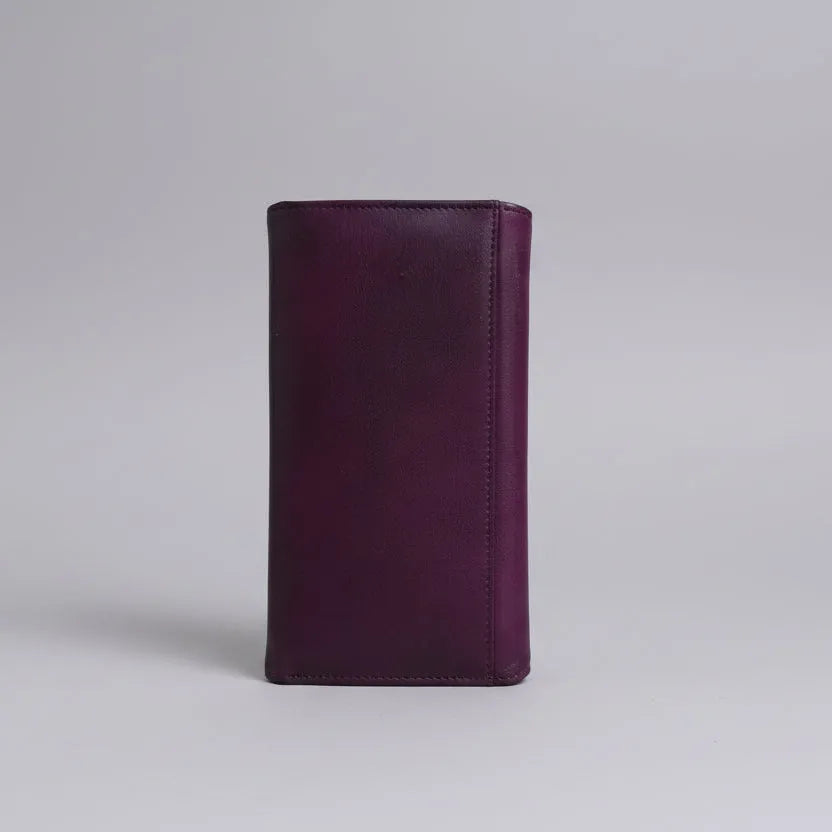 Purple leather wallet on a light gray background