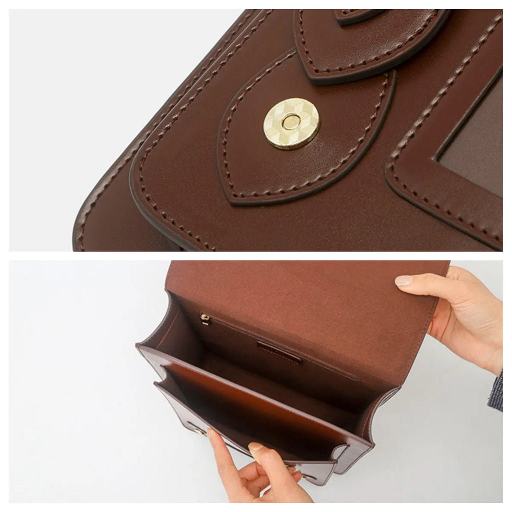 Brown leather clutch bag with gold button detail on a white background