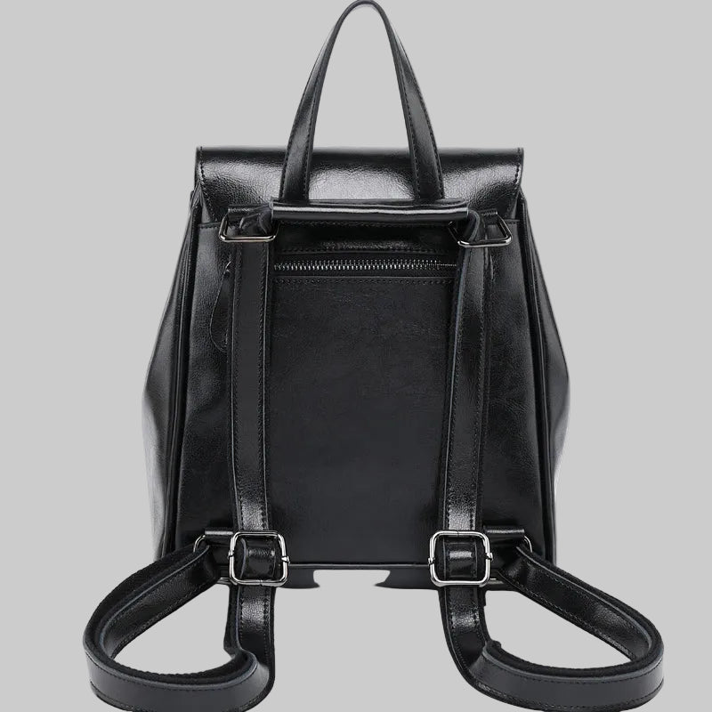 Black backpack on a light gray background