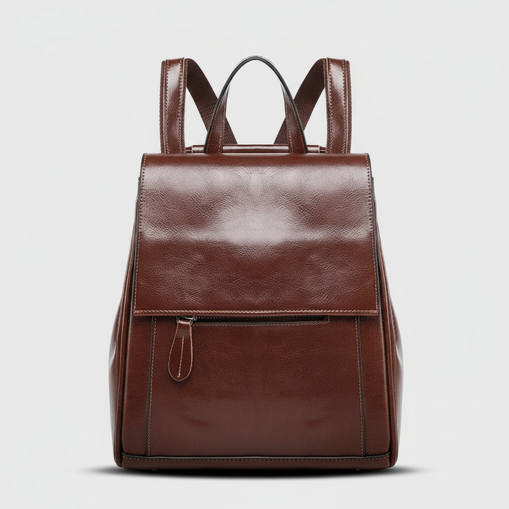 Brown leather backpack on a light gray background