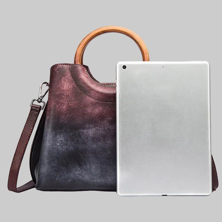 Handbag and tablet case on a gray background