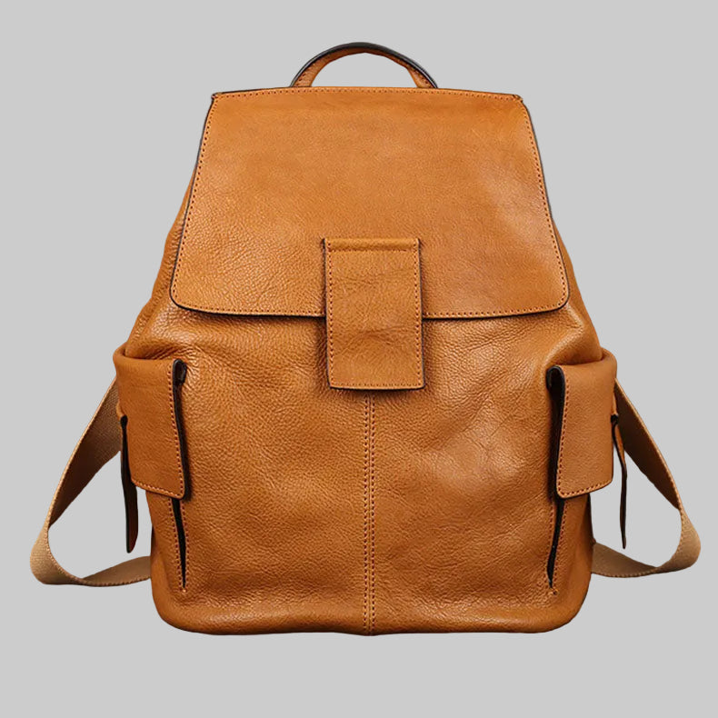 A brown genuine leather backpack purse with adjustable straps and multiple pockets, displayed against a neutral background.